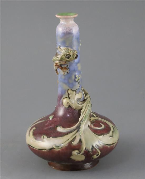 Mark V Marshall for Doulton lambeth, a flambe bottle vase entwined by a mythical beast