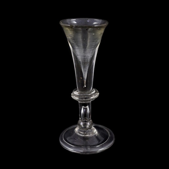 An English baluster toastmaster's glass c.1720