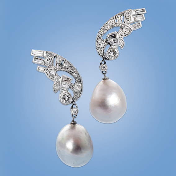 A fine pair of Art Deco natural pearl and diamond earrings, 1930s