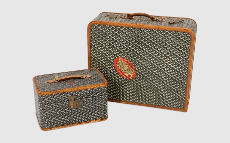 A 1940's Goyard vanity case with matching suitcase,