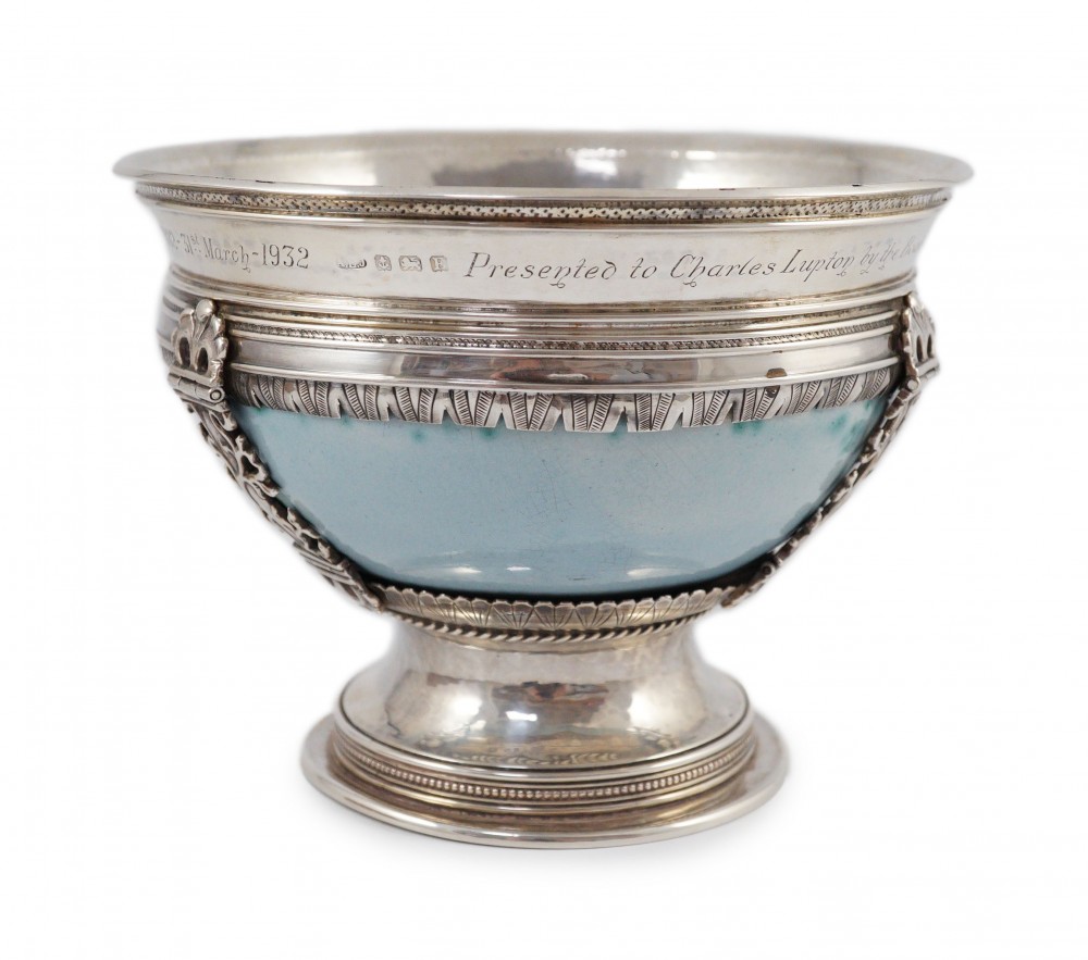 An Arts and Crafts silver mounted Ruskin pottery pedestal bowl