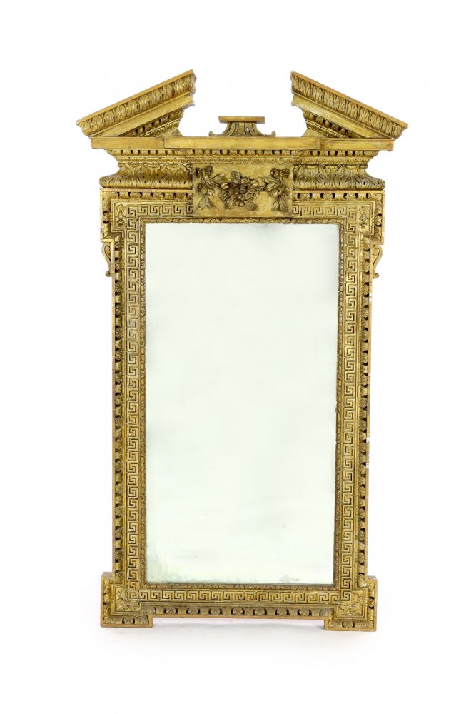 A George II carved giltwood William Kent design wall mirror