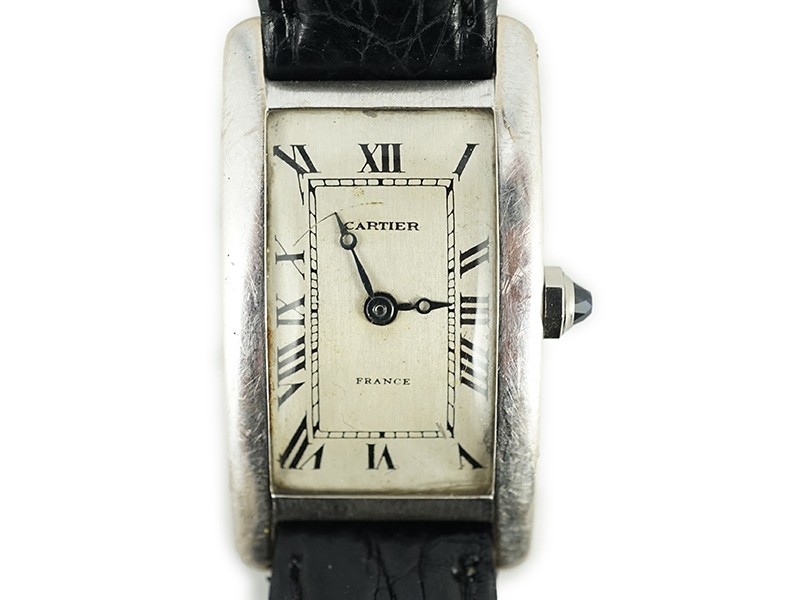 A mid 20th century 18ct white gold Cartier Tank Americane manual wind wrist watch