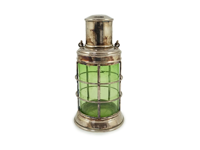 An Asprey & Co. silver plated and green glass novelty cocktail shaker in the form of a lantern