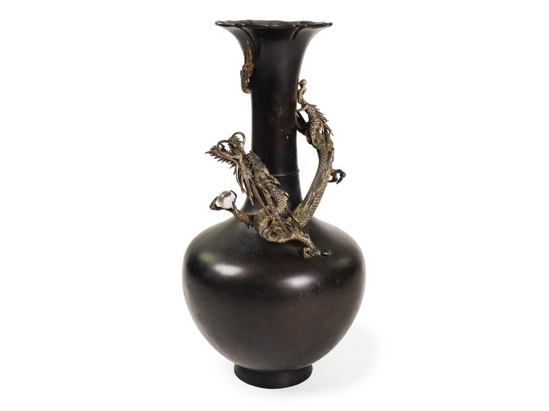 A massive Japanese bronze ‘dragon’ bottle vase, Meiji period A massive Japanese bronze ‘dragon’ bottle vase, Meiji period