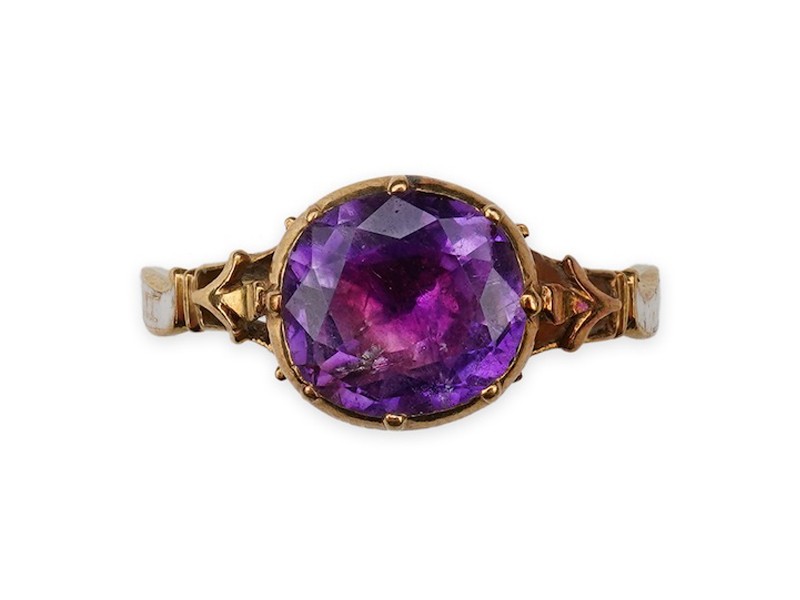 A rare and unusual George III amethyst and enamel mourning ring, late 18th century