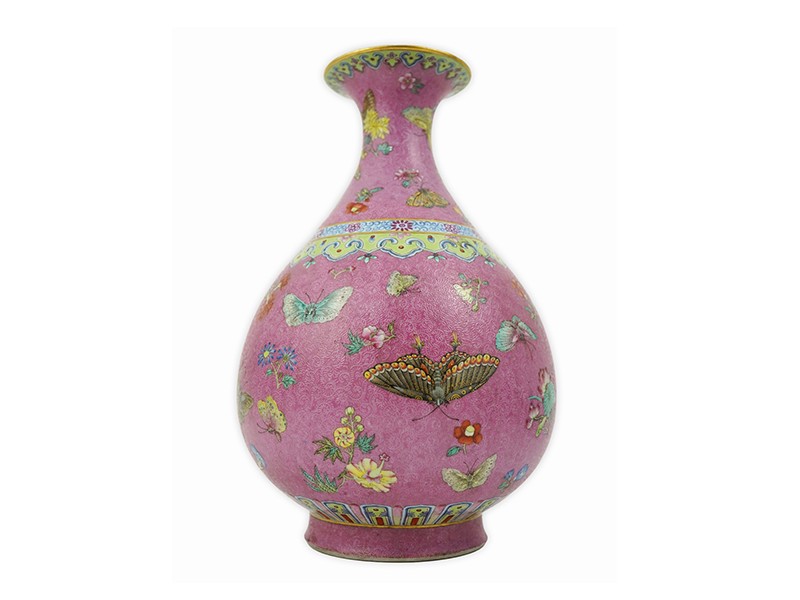 A Chinese pink-ground sgraffito pear-shaped vase, yuhuchunping, Daoguang six character seal mark and of the period (1821-50) A Chinese pink-ground sgraffito pear-shaped vase, yuhuchunping, Daoguang six character seal mark and of the period (1821-50)